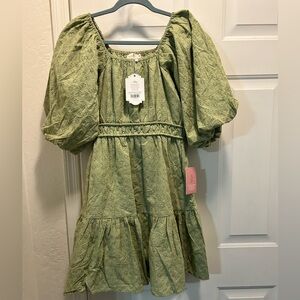 Ivy City Co. Kinsey Dress in green.